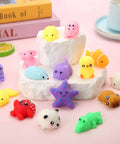 Colorful 30 Pack Totally Rad Squishy Toys Mini Kawaii Mochi Squeeze Buddies in various shapes on display.