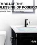 Matte Black Bathroom Faucet With Modern Waterfall Spout installed on a white vanity in contemporary bathroom setting