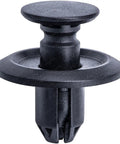 Close-up of a black plastic 30 Piece Fender Liner Push Type Retainer Clip from Set MU488006, designed for Mitsubishi vehicles.