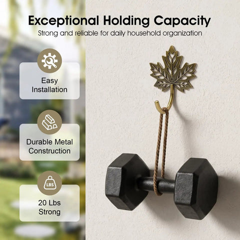 Legit Vintage Maple Leaf Wall Hooks Gold Finish Heavy Duty Decorative Rack Built Tough For Coats And Keys Straight Up Farmhouse Home Organization Two Pack with dumbbells hanging.