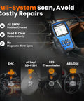 Person holding BM700 Pro BMW Scanner With Auto VIN And Battery Registration Tool, Code Reader inside car, showing scan features.