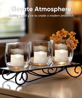 Flameless Tealight Candles With Remote Timer Battery Operated 12 Pack Warm White in glass holders on metal stand