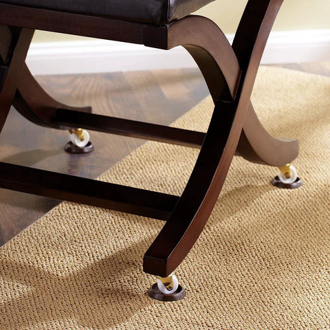 Wooden chair on carpet with One And Eleven Sixteenths Inch Round Furniture Caster Cups For Carpet Or Hard Floors Protects Carpet From Dents