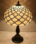 Tiffany Style Cream Amber Stained Glass Table Lamp With Bead Accents, lit on, 12 Inch Shade, 18 Inch Tall, Antique Green Bronze Base
