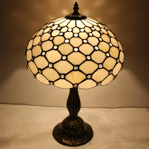 Tiffany Style Cream Amber Stained Glass Table Lamp With Bead Accents, lit on, 12 Inch Shade, 18 Inch Tall, Antique Green Bronze Base