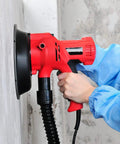 Person using Electric Drywall Sander With Vacuum For Dustless Sanding, 710W Portable Handheld Wall And Ceiling Sander on wall