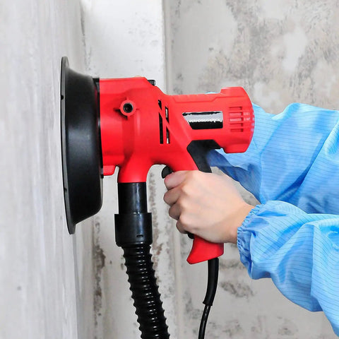 Person using Electric Drywall Sander With Vacuum For Dustless Sanding, 710W Portable Handheld Wall And Ceiling Sander on wall