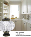 Clear Acrylic Pumpkin Cabinet Knobs Set Of 20 Vintage Decorative Pulls in a kitchen with white cabinets.