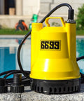 One Sixth Horsepower Portable Submersible Utility Pump For Home Flood Cleanup beside pool, yellow with black base