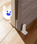 4 Pack Universal Sliding Door Bottom Guide In White ABS Floor Track For One And Three Eighths Inch Thick Closet And Cabinet Doors Includes Mounting Screws And Side Support To Keep Doors Centered And Sliding Smoothly shown installed on wooden floor, guiding closed doors.