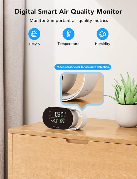 Smart Air Quality Monitor With PM2.5 Sensor, WiFi, Temperature And Humidity Tracking on a wooden dresser next to a plant