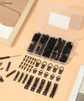 Tough As Nails Heavy Duty Picture Hanging Kit With Slick Storage Box And Rust Proof Hardware includes black D Ring hangers and sawtooth hangers.