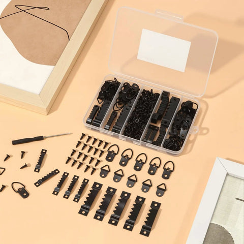 Tough As Nails Heavy Duty Picture Hanging Kit With Slick Storage Box And Rust Proof Hardware includes black D Ring hangers and sawtooth hangers.
