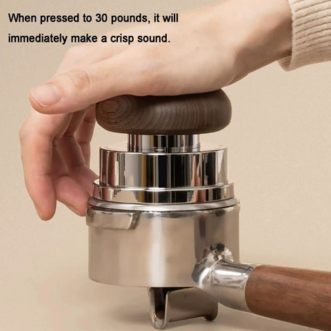 Person using 58 Mm Espresso Tamper Kit With Fine Wdt Needle Tool And Gravity Distributor, showcasing pressure application.