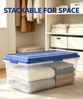 Straight Up Heavy Duty 113 Qt Long Storage Bin With Secure Snap On Lid, Crystal Clear Stackable Plastic Tote For Bulky Blankets And Seasonal Gear, Rock Solid Zero Fuss Garage Organizer filled with neatly folded blankets in a closet.