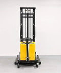 Wide Leg Semi Electric Pallet Stacker Built Tough To Hustle 3307 Pound Pallets Straight Up To 138 Inches Smooth As Butter Daily front view with controls.