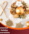 Holiday decorations with gold ornaments and candy canes, protected with packing paper sheets for moving boxes.