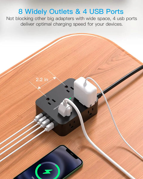 8 Outlet Power Strip With 4 USB Ports 5 Ft Flat Plug Wall Mount ETI Listed Black on wooden desk with devices connected