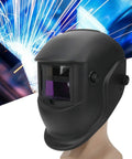 Stylish Ultralight Welding Helmet With Automatic Dimming For Serious Industrial Pros Featuring Durable ABS Construction And Solar Power To Keep You Safe During Long Heavy Duty Jobs Without The Weight Or Fatigue, shown from the front with sparks in the background.