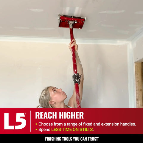 Person using 10 Inch Mega Flat Box for Drywall Finishing Pro Grade on ceiling with extension handle