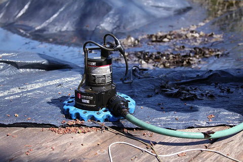 Reinforced Thermoplastic Pool Cover Pump With One Quarter HP Motor, Auto On Off, iSwitch Sensor, Quick Water Removal in use