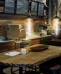 Retro Edison Look LED Filament Bulbs T10 Tubular 12W Dimmable in a cozy cafe setting with warm wood and modern decor