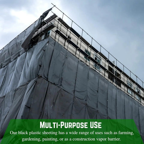 Building covered with 4 Mil Black Plastic Sheeting Roll 4 Ft By 100 Ft Heavy Duty Polyethylene Tarp For Painters And Construction Vapor Barrier