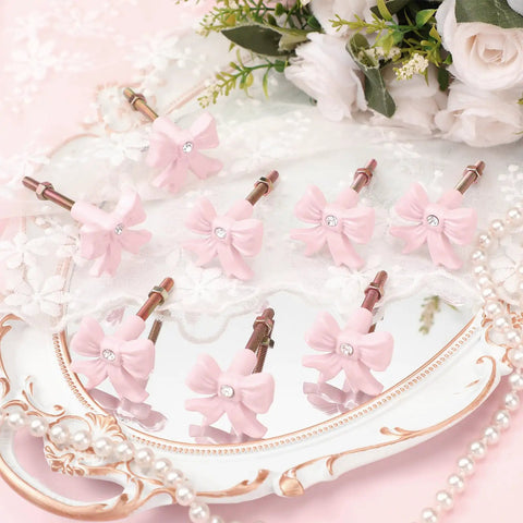 Eight Piece Pink Bow Dresser Knob Set Cast Iron Drawer Pulls For Cabinets And Wardrobes Vintage Coquette Style on mirror