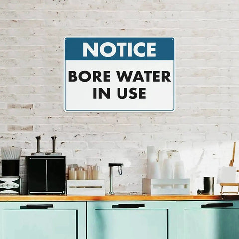 Water In Use Aluminum Heads Up Sign 8x12 UV Printed Notice Plaque For Home Farms Businesses And Facilities Indoor Outdoor Water Supply Zones High Visibility Safety Marker on white brick wall