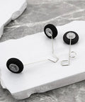 Three metal and sponge tires for Five Pair Front And Rear RC Plane Wheels For Foam Fighter F22 Su27 HW33 on marble surface
