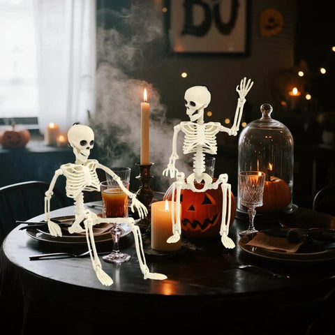 Two 15.7 Inch Hanging Skeleton Decorations With Full Body Posed Joints on a table, spooky Halloween decor