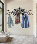 Upgrade Your Space With This Super Sturdy Scroll Metal Coat Rack And Grab A Quick Jacket On This Dang Good Looking Wall Mounted Hat Rack. Wall mounted coat rack with scroll design holding jackets in stylish entryway.