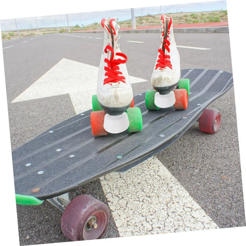 Skates with 2 pack rubber toe stops for roller skates and quad skates on a longboard on paved road