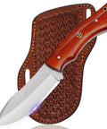 Enterprise Handmade Fixed Blade Hunting Knife with stainless steel blade and red wood handle resting on leather sheath
