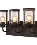 Three Light Indoor Vanity Light Wall Fixture in Oil Rubbed Bronze with Clear Seeded Glass, installed on a wall, front view.