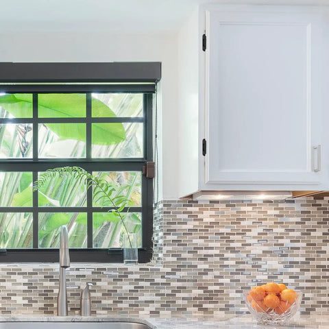 Heavy Duty Self Closing Cabinet Hinges With Smooth As Butter Soft Close For Half Inch Overlay Doors 4 Pack Easy Install Matte Black Finish in modern kitchen with window and backsplash.