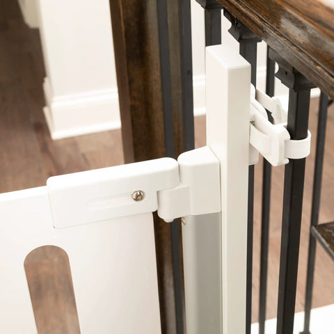 Stress Free Stair Gate Mount Adapter for Banisters and Spindles no screws needed attached to a wooden banister and gate