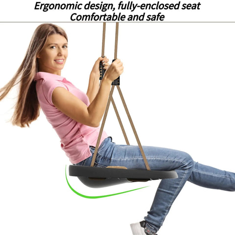 Adult using Heavy Duty Swing Seat For Adults And Kids With Weatherproof Ropes, Height Adjustable Tree Swing Accessory For Backyard Patio Garden Playground, Built To Last Up To 500 Lbs, Black.