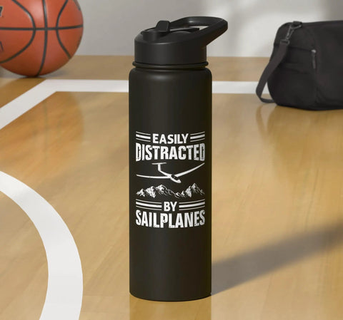 Soaring Sailplane Pilot Water Bottle For Glider Enthusiasts with text "Easily Distracted by Sailplanes" on a basketball court.