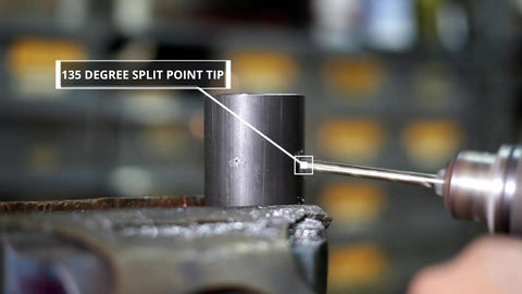 Close-up of M42 Cobalt Drill Bit Set showing 135-degree split point tip drilling into metal surface.