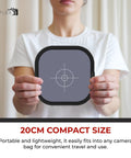 Turn Up Your Photo Game With This Compact Dual Sided 18 Percent Grey Reference Card For Flawless Camera White Balance And Consistent Exposure Settings, shown in hands with target design, 20cm size.