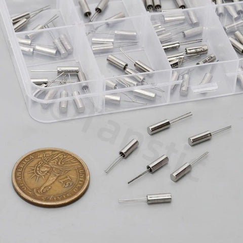 96 Pcs 3x8mm DIP Quartz Crystal Oscillators Kit with coin for size comparison, shown in compartment box