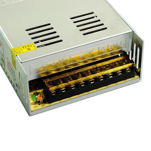 Close-up of a metal-cased Beefy 12V DC Power Supply 30A 360W Switching Converter from AC 100-240V to 12V for LED strips and CCTV