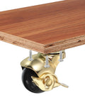 1.5 Inch Ball Caster Wheels With Brake, gold finish, mounted on wooden board, 360 degree swivel, includes M4 screws