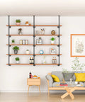 Industrial Iron Pipe Shelving Brackets Set For Kitchen And Living Room mounted on wall with decorative items, 5-tier