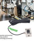Heavy Duty S Beam Load Cell Sensor For Precision Force Measurement In Industrial Weighing Systems 100N Capacity With Tension And Compression Stainless Steel Transducer Built To Handle Tough Lab And Factory Applications shown next to industrial machinery.