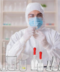 Scientist using 31 Piece Lab Glassware Set With Beakers Cylinders Erlenmeyer Flasks Dropper Bottles in a lab setting.