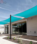 Turquoise 11 By 11 Sun Shade Sail Waterproof Rectangle Canopy for Patio Outdoor Cover UV Block Tarp Cloth covering an outdoor patio