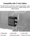 Camera Cable Lock Clamp 4 Pack For HDMI SDI And Microphone Cables Keeps DSLR Rig Cages And Handles Looking Clean No Cable Mess One Quarter Inch Twenty Mount Compatible shown attached to DSLR cage