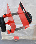 Top Shelf Heavy Duty Panel Dolly And Portable Drywall Sheet Cart With Adjustable Clamps, showing red steel frame and solid tires.